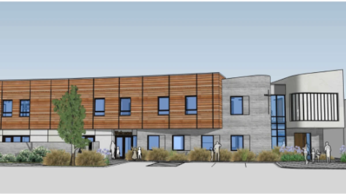 A vibrant and detailed rendering of the new preschool facility, showcasing a modern and welcoming design. The building features large windows that flood the interior with natural light, surrounded by lush green spaces.